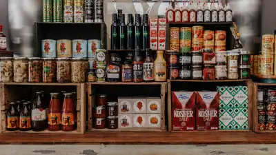 Bottega Volo | Cans, jars and other pantry items on shelves at Bottega Volo