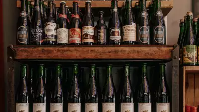 Bottega Volo | Wine bottles lined up on a shelf at Bottega Volo