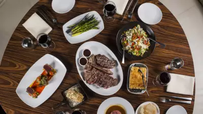 Toronto's best steakhouses | An overhead shot of steak and sides at STK Toronto