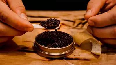 Scooping caviar at Parc Ave in Yorkville