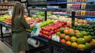 Shopping for fresh produce inside Nature's Emporium in downtown Toronto