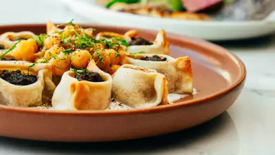 Taline Toronto | Armenian Dumplings Made With ground beef, mint, tomato consommé and sumac