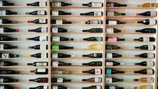Grape Crush bottle shop and wine bar | A wall of bottles at Grape Crush
