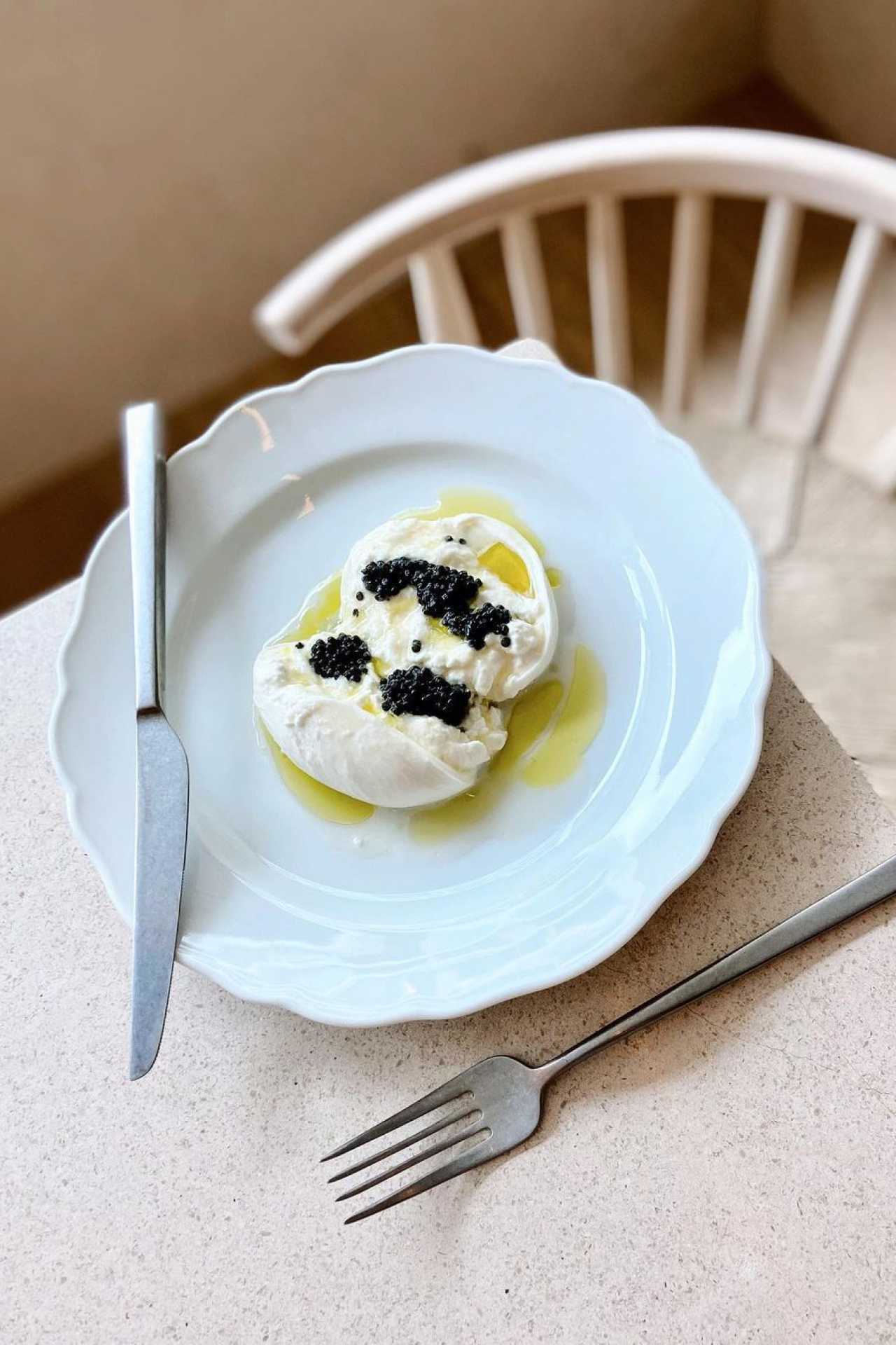 At Osteria Giulia, the Burrata a Caviale incorporates caviar At Osteria Giulia, the Burrata a Caviale incorporates caviar