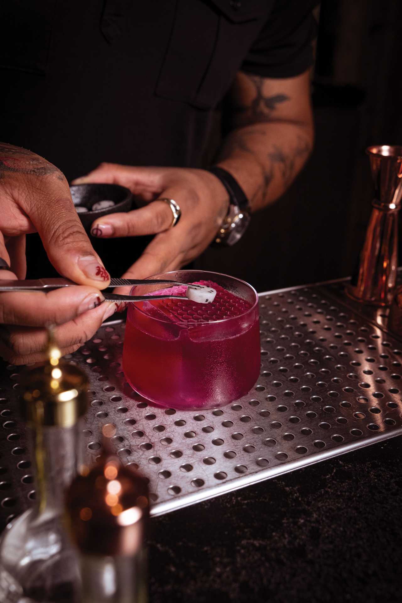 Baijiu in Toronto | Bitter Melon’s Daniel Desir putting the finishing touches on a cocktail Baijiu in Toronto | Bitter Melon’s Daniel Desir putting the finishing touches on a cocktail