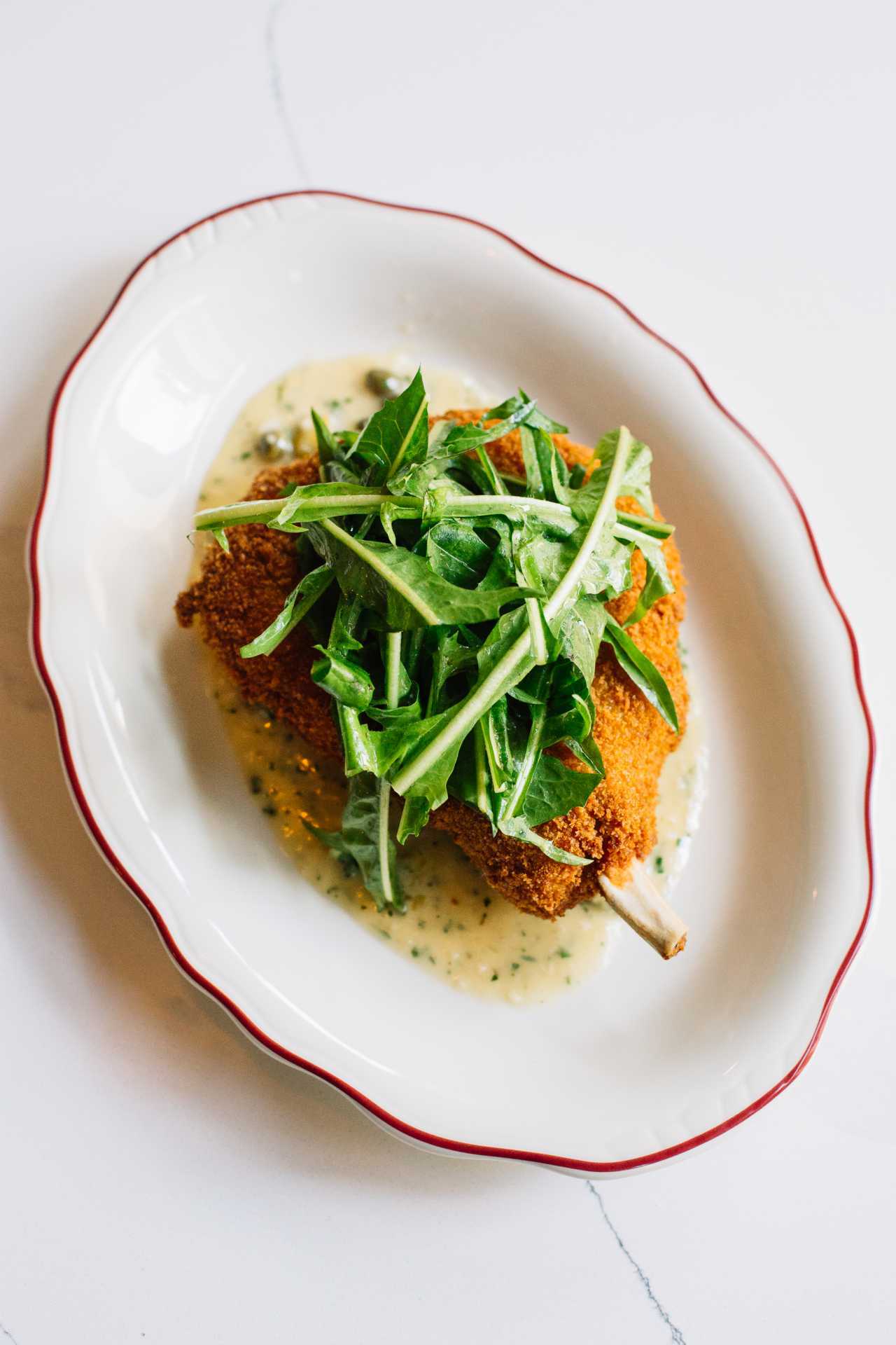 Contrada restaurant in Toronto | Pork chop alla milanese Contrada restaurant in Toronto | Pork chop alla milanese