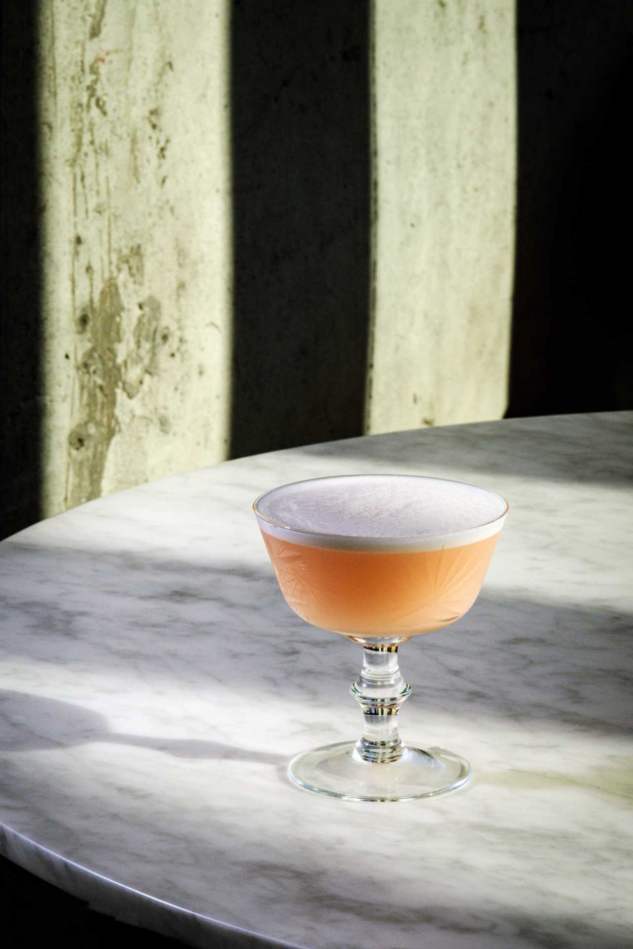 Hotel Lisbon | Aunt Spike cocktail with gin, white port, peach aperitif and egg whites Hotel Lisbon | Aunt Spike cocktail with gin, white port, peach aperitif and egg whites
