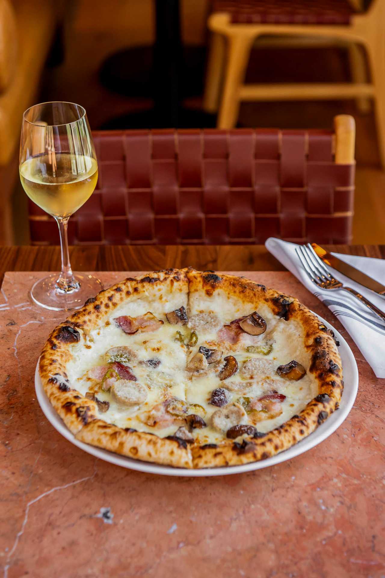 Best new Toronto restaurants | Mushroom pizza and wine at Bridgette Bar Toronto