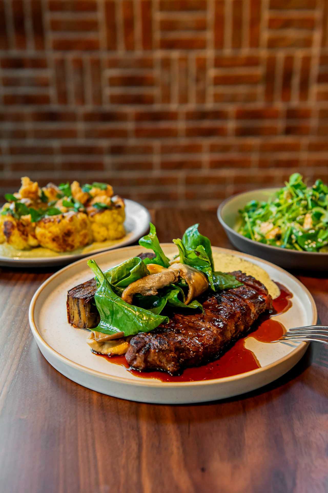 Best new Toronto restaurants | A spread of dishes at Bridgette Bar Toronto