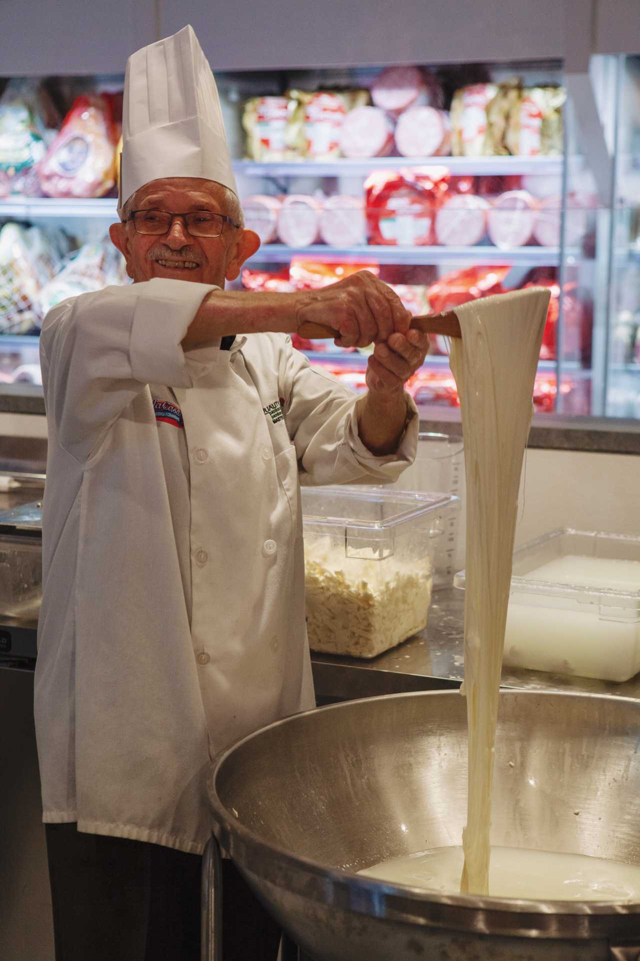 Best Italian restaurants in Toronto | A chef making cheese at Eataly, Toronto