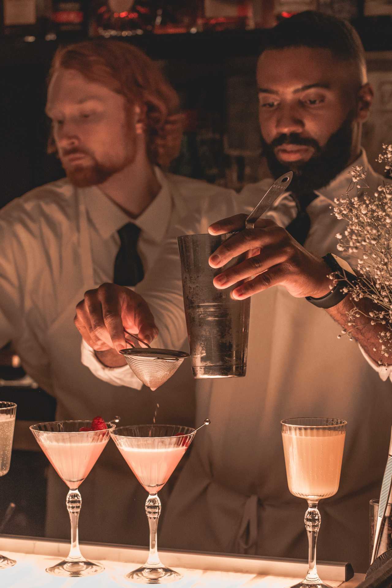 Cafe Renée, Toronto | A bartender making cocktails at Cafe Renée