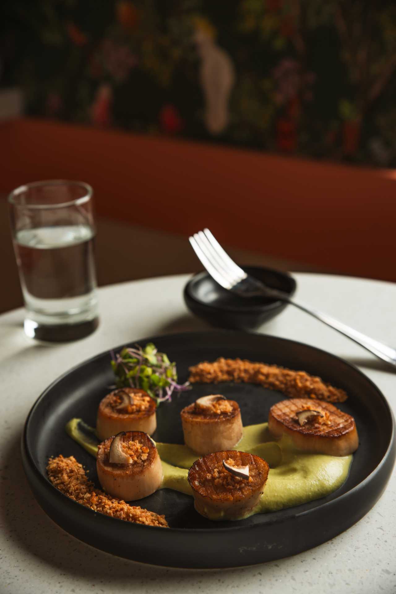 The best bars in Toronto |A plate of mushroom scallops at Electric Bill