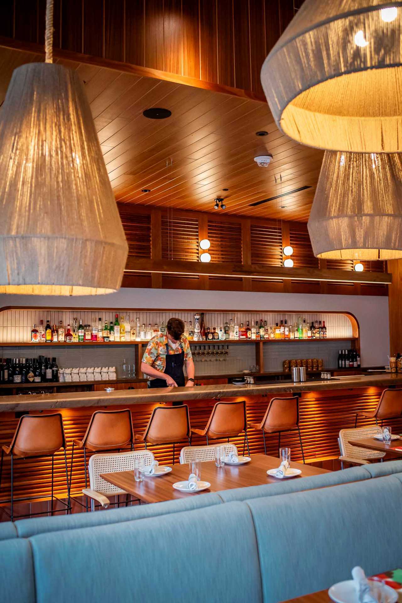 The best bars in Toronto | A bartender at the bar at Lulu Bar
