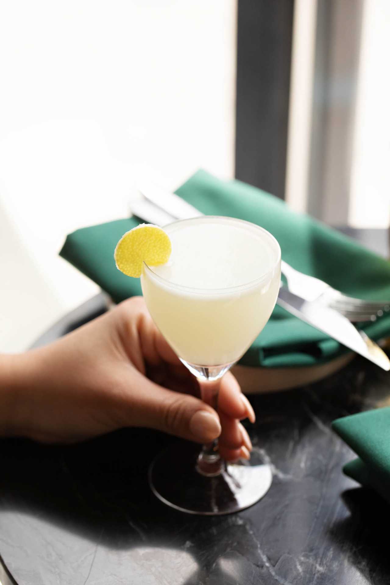 The best bars in Toronto | A cocktail garnished with citrus at Simpl Things