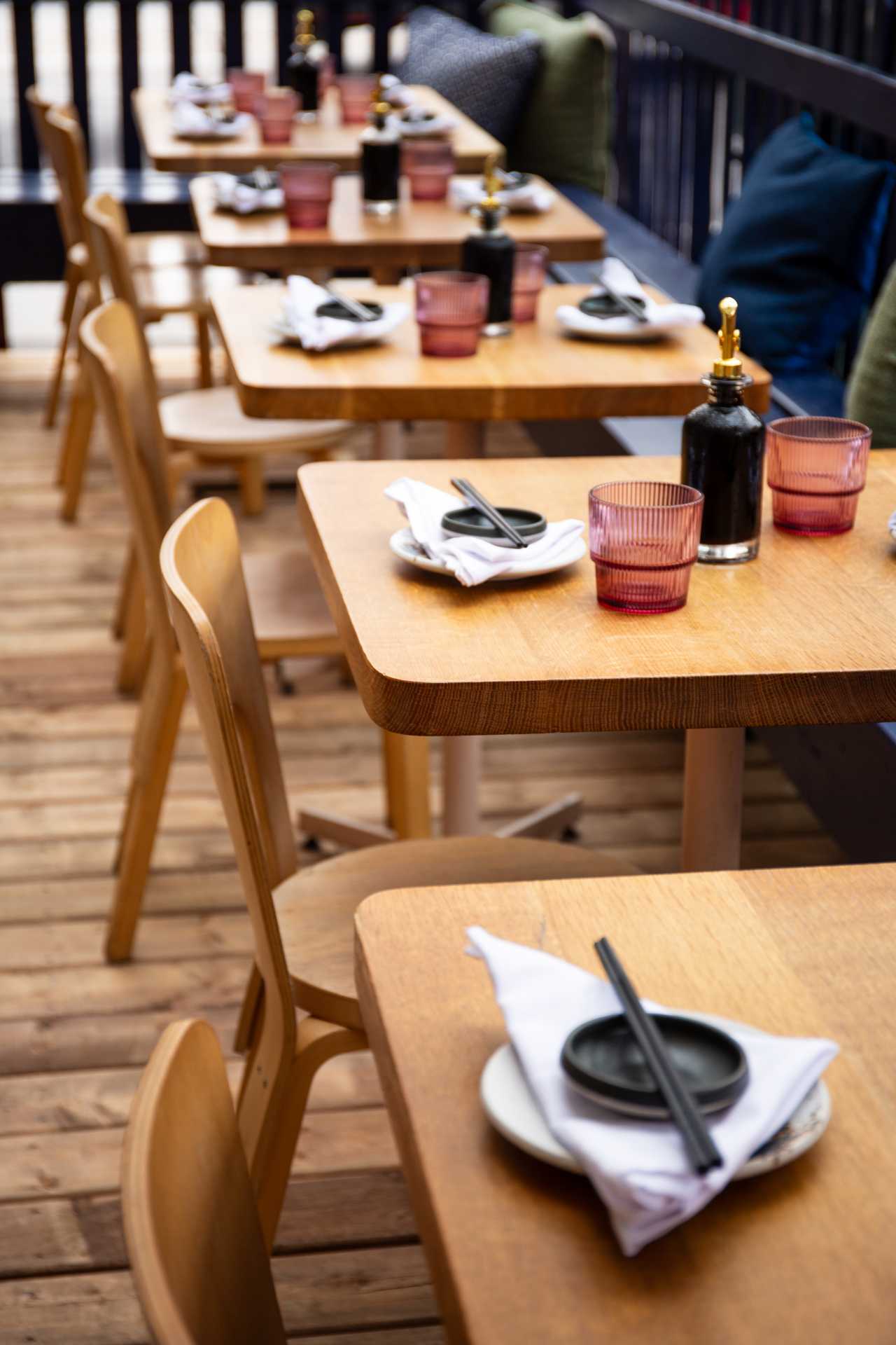 New restaurants Toronto | Neatly arrange chopsticks and plates at Sushi Momo