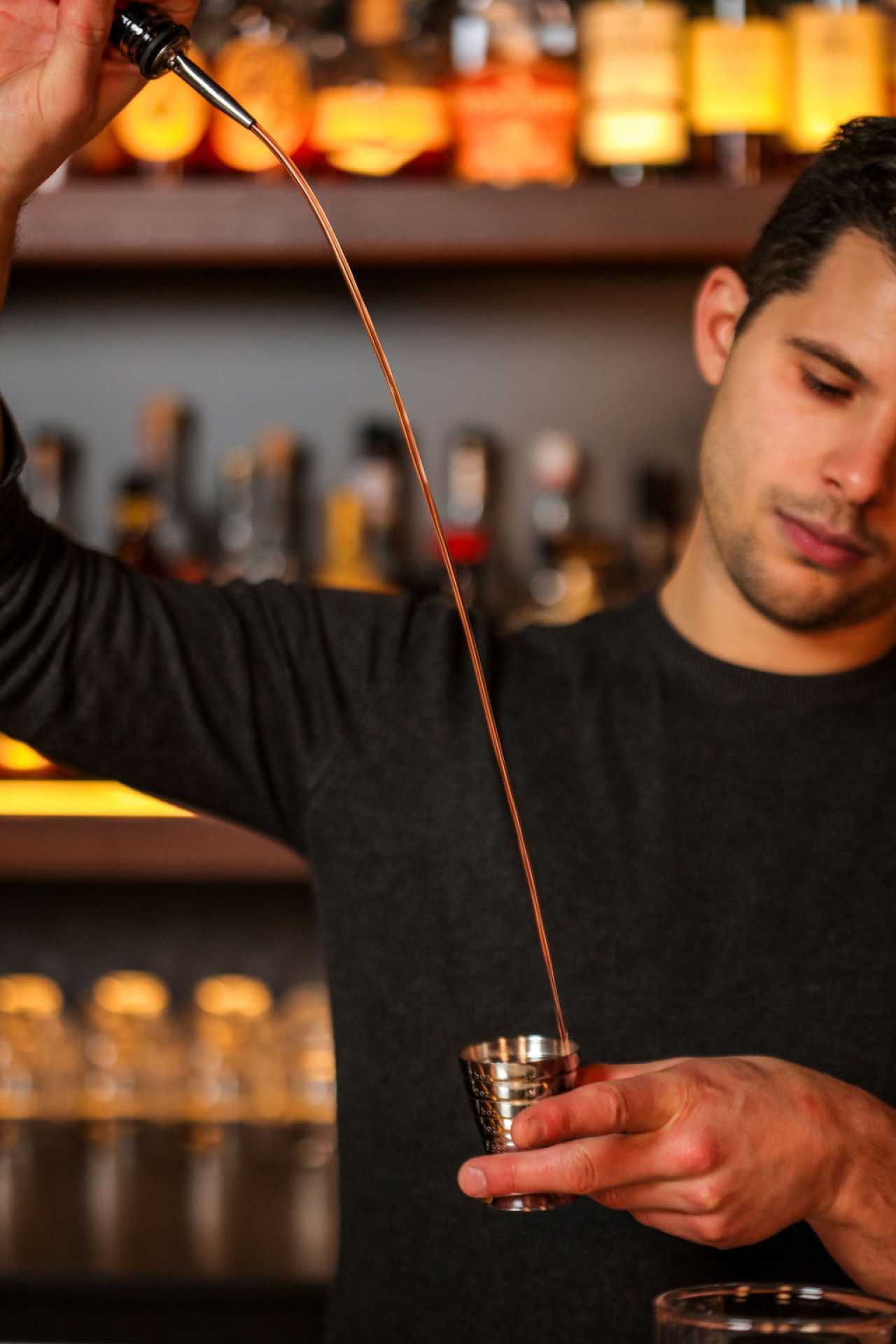 Jacob Martin making a cocktail Jacob Martin making a cocktail