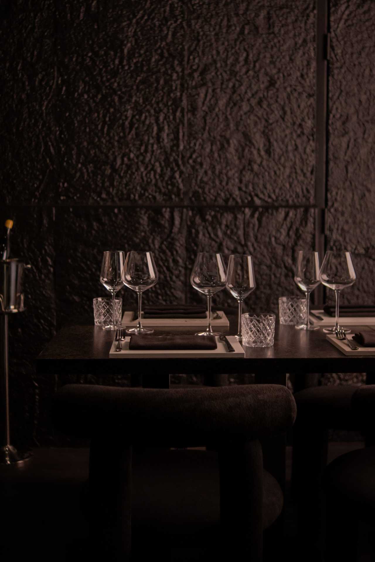 The best restaurants in Toronto | A set table with glassware inside Lyla Toronto
