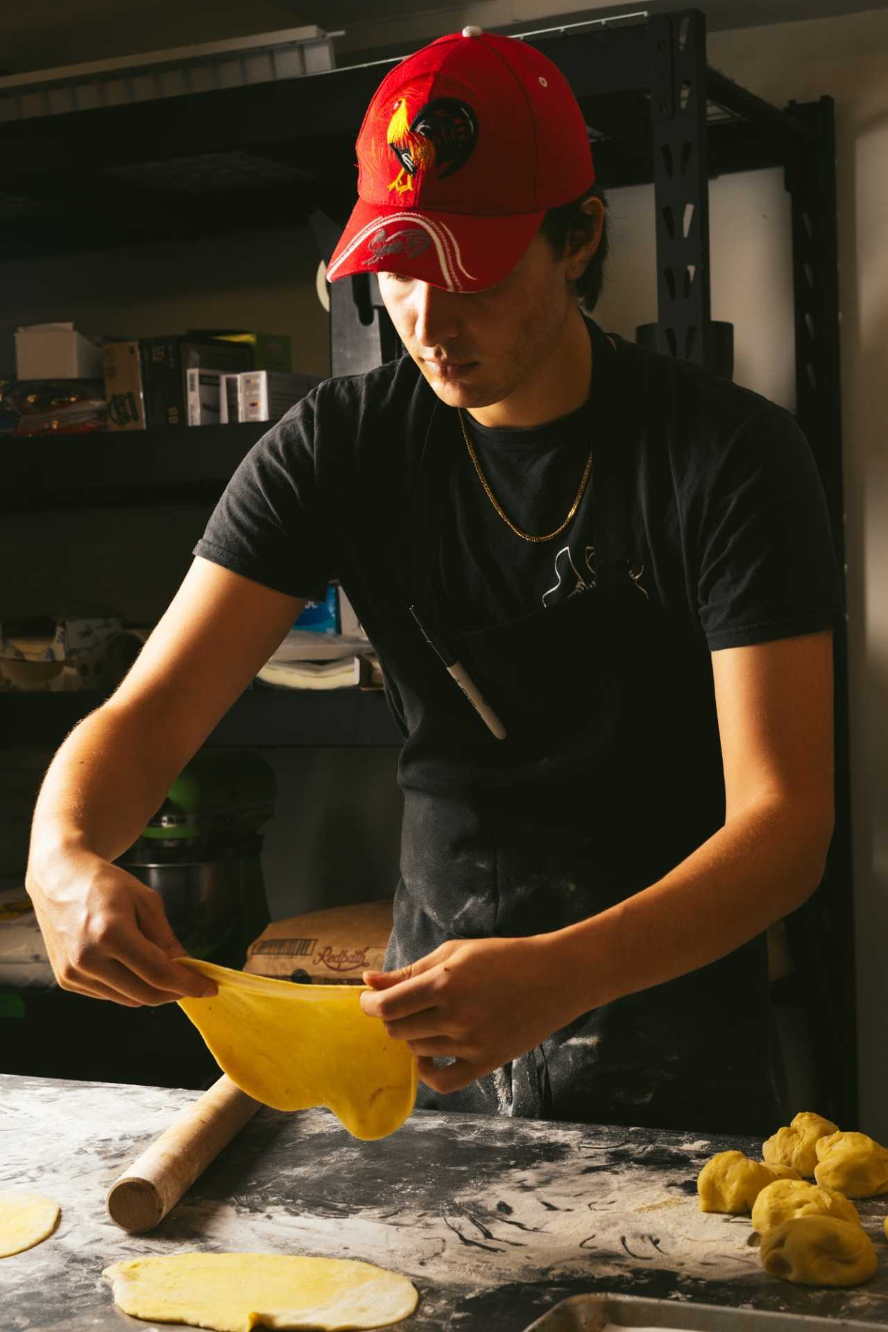 Farm-to-table dining in Qu&eacute;bec: A chef prepares a dish at Chez Greenberg