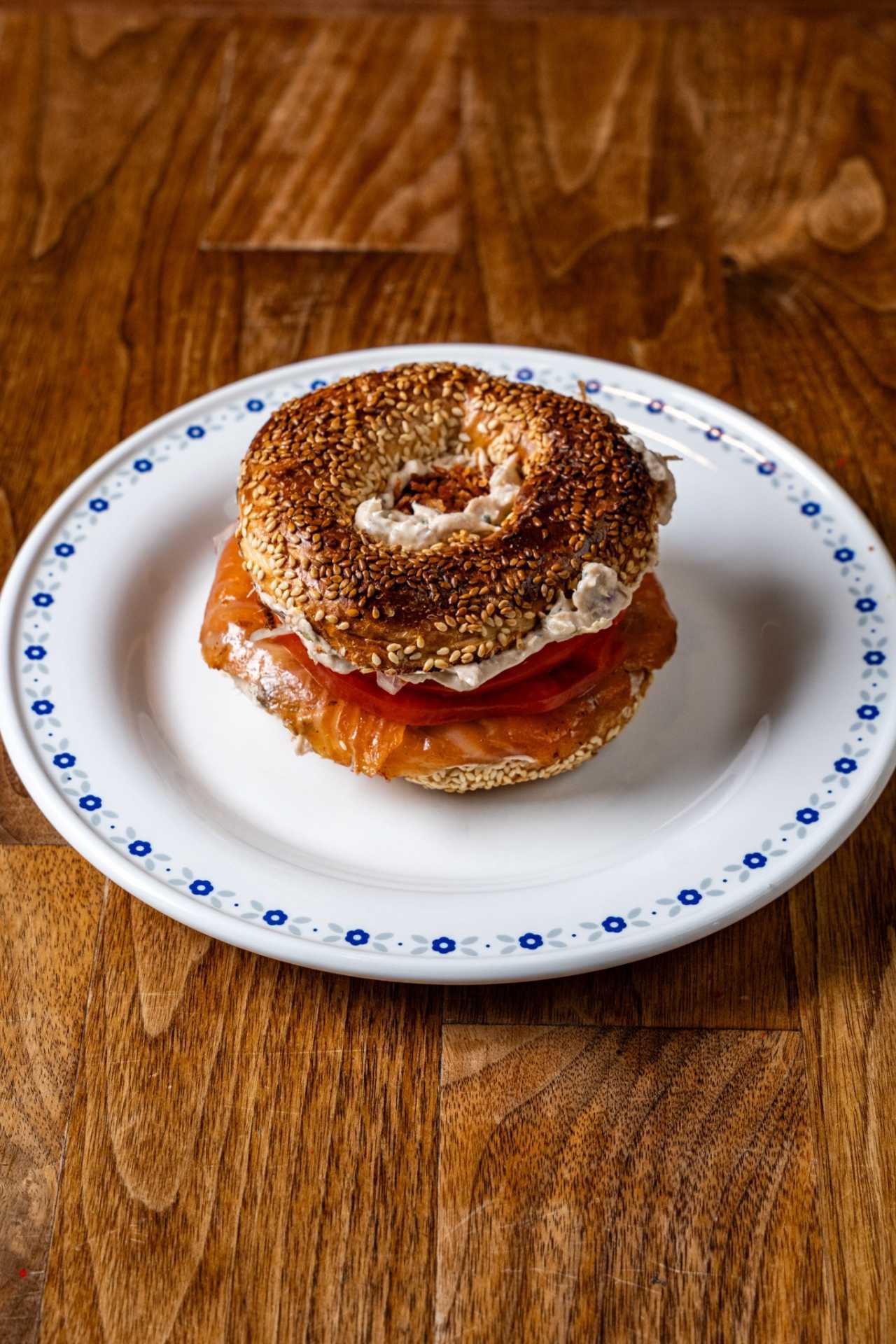 Farm-to-table dining in Qu&eacute;bec: A bagel stacked with cream cheese, capers and smoked salmon at Chez Greenberg