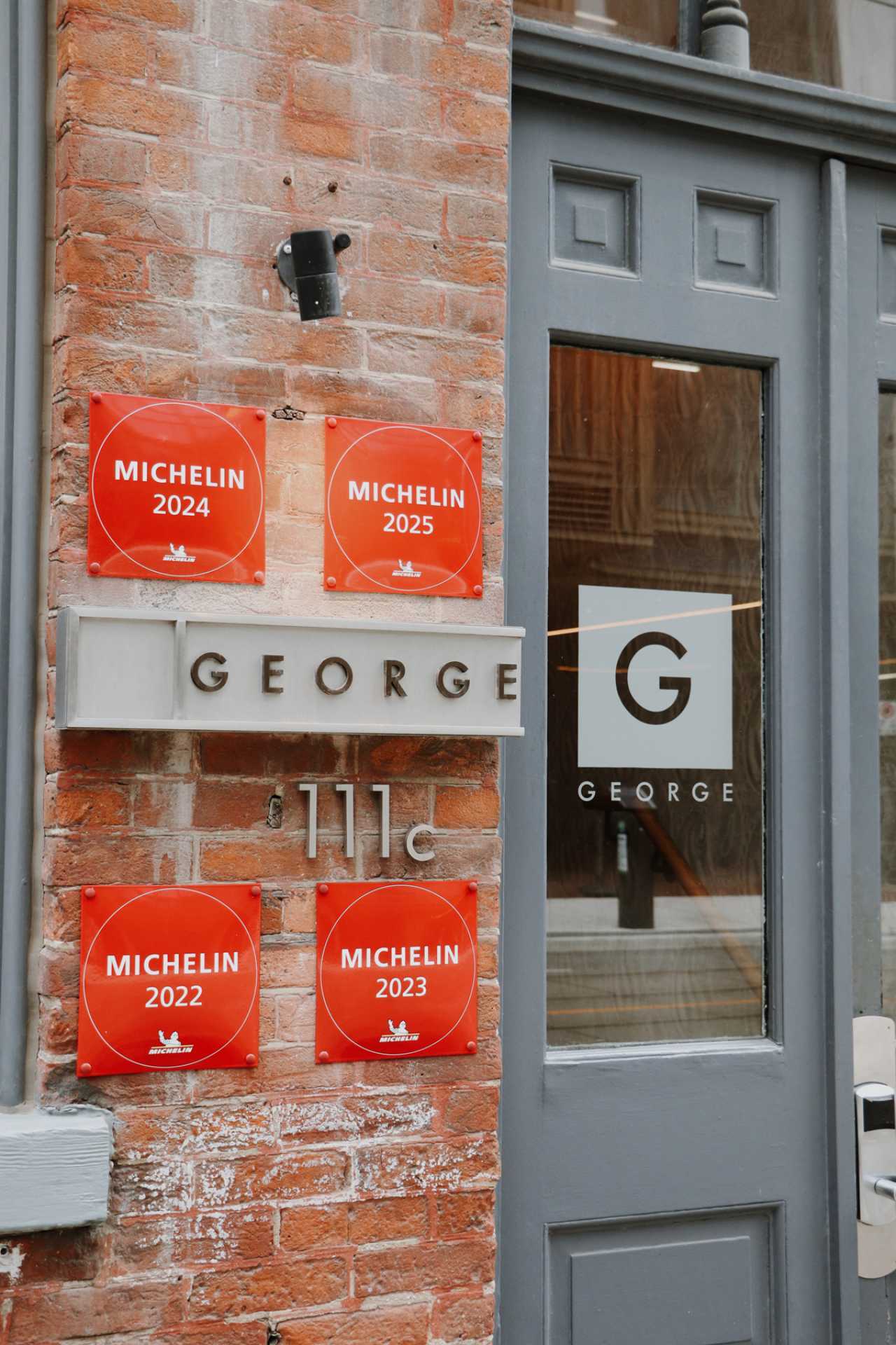 George Restaurant | The Michelin plaques on the front of George Restaurant on Queen Street East