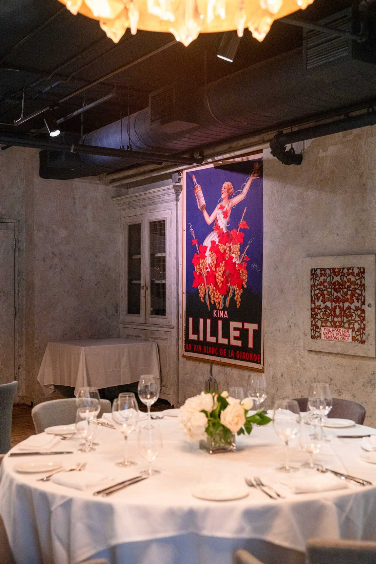 George Restaurant | A vintage poster on the wall of the dining room at George Restaurant