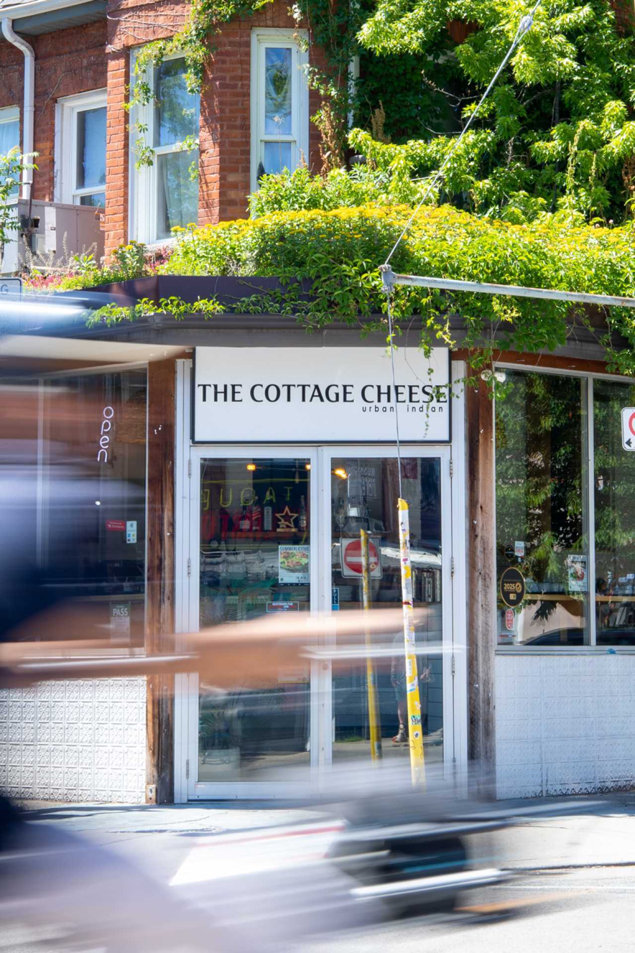 Summerlicious Toronto | A shot of the exterior of The Cottage Cheese in Kensington Market, which is taking part in Summerlicious Toronto