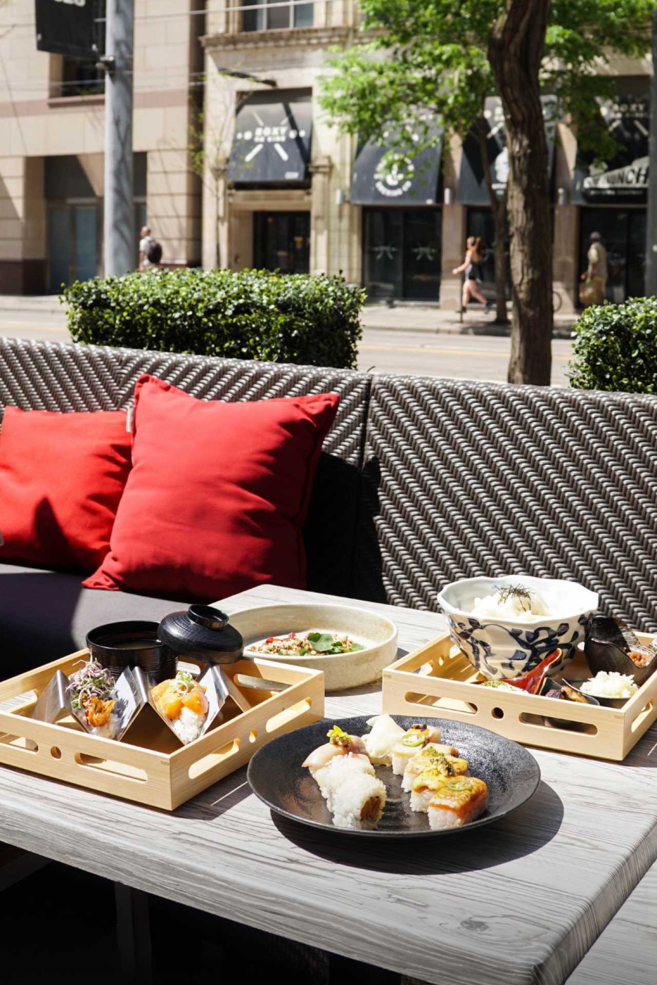 Summerlicious Toronto | A spread of food on the Summerlicious Toronto menu at Minami's downtown patio