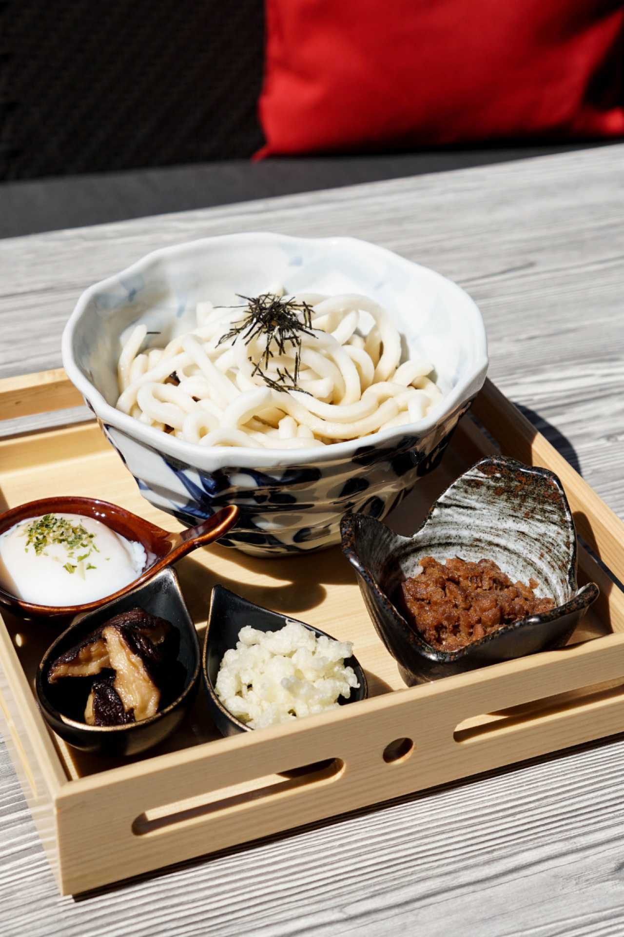 Summerlicious Toronto | A platter of noodles and side dishes on the menu at Minami for Summerlicious Toronto