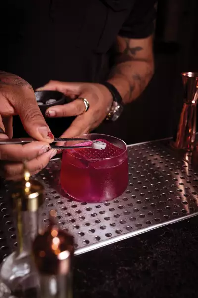 Baijiu in Toronto | Bitter Melon&rsquo;s Daniel Desir putting the finishing touches on a cocktail