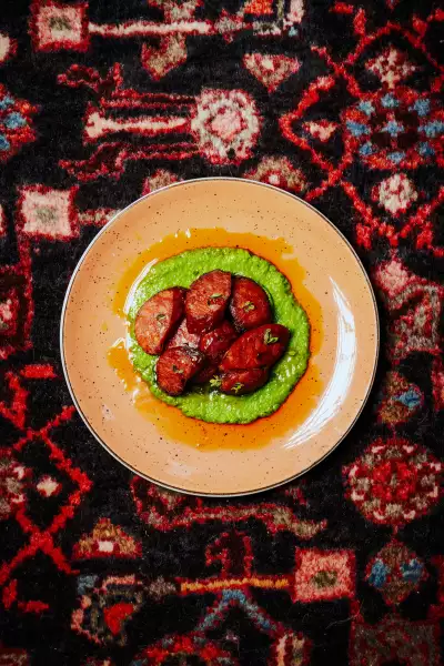Warm Chorizo with a Green Sauce at Lisbon Hotel