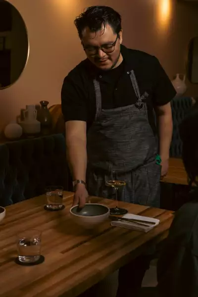 Ficoa tasting menu Toronto | Chef Gerry Quintero delivers a dish at Little Italy's Ficoa