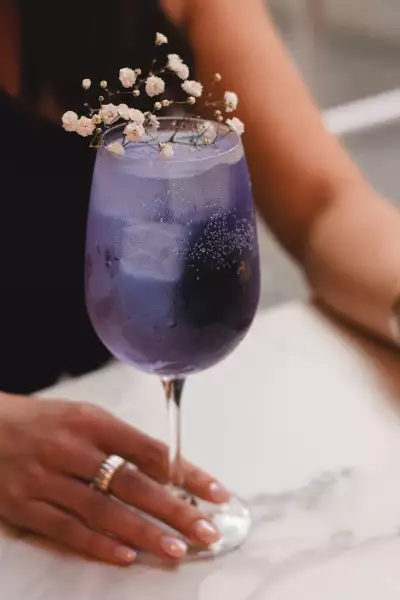 Cafe Renée, Toronto | A purple cocktail at Cafe Renée