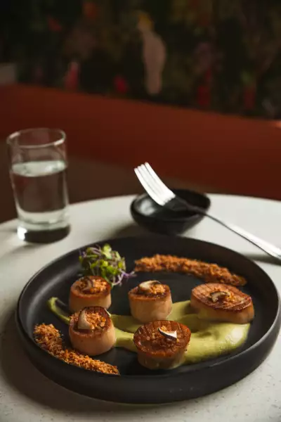 The best bars in Toronto |A plate of mushroom scallops at Electric Bill
