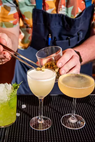 The best bars in Toronto | Garnishing a sour at Lulu Bar