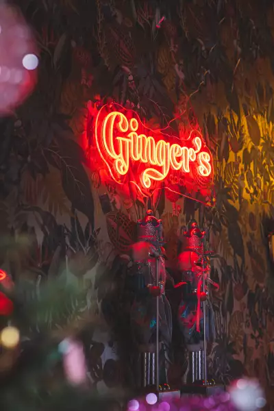 Best Christmas bars and markets in Toronto | A neon sign inside Ginger's Cocktail Bar