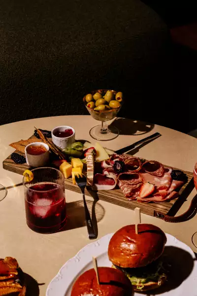 A charcuterie board inside Mercer Lounge in Le Germain Hotel Toronto Mercer