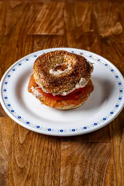 Farm-to-table dining in Qu&eacute;bec: A bagel stacked with cream cheese, capers and smoked salmon at Chez Greenberg
