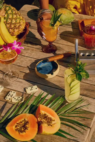 Best patios in Toronto | A shot of cocktails, dominoes and cigars at Havana Nights, Evangeline's summer pop-up on Ace Hotel's rooftop