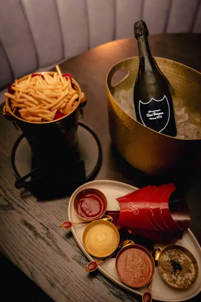 Best happy hours in Toronto | Fries and caviar at Powder Room