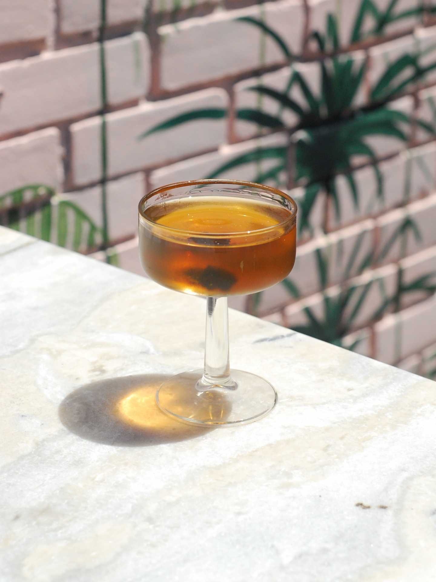 Best cocktail bars in Toronto | A cocktail on the patio at Cocktail Bar
