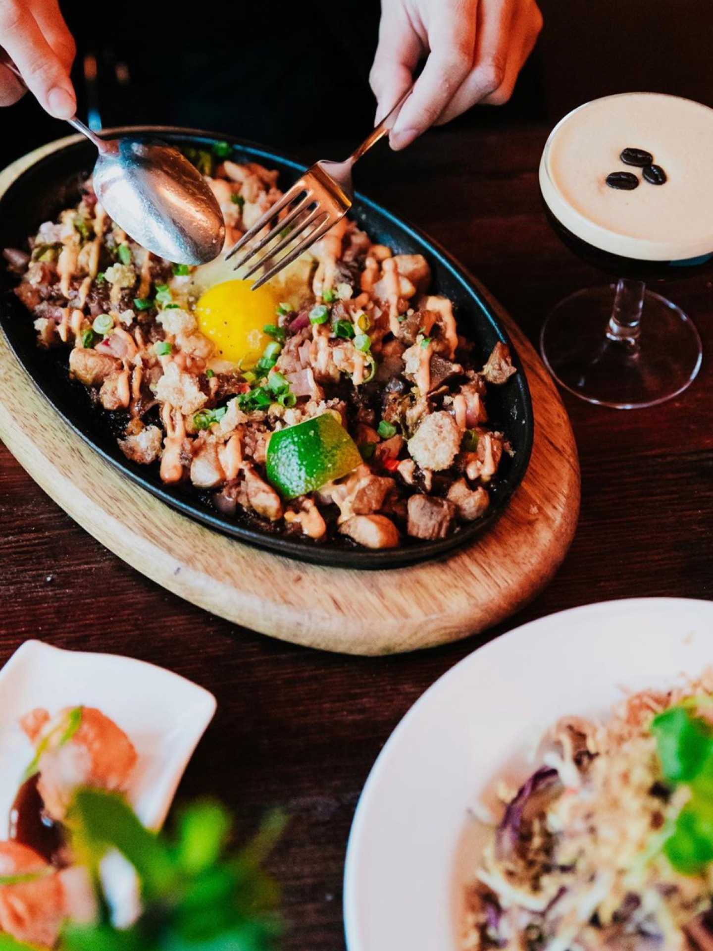 Filipino restaurants Toronto | Dishes and an espresso martini at Islas Filipino BBQ and Bar Filipino restaurants Toronto | Dishes and an espresso martini at Islas Filipino BBQ and Bar