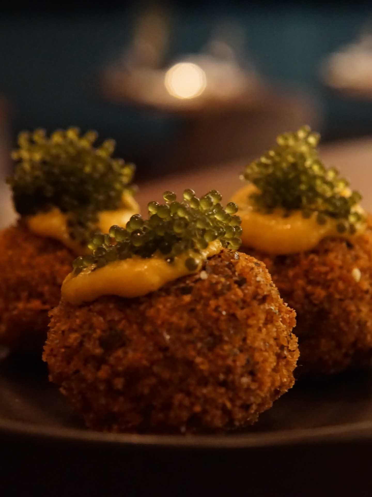 Vegan crab cakes with sea pearl caviar at Bar Avelo Vegan crab cakes with sea pearl caviar at Bar Avelo
