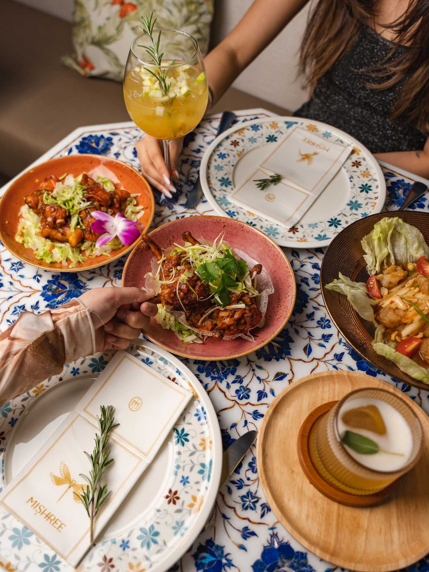 Best new Toronto restaurants | A spread of dishes and cocktails at Mishree Best new Toronto restaurants | A spread of dishes and cocktails at Mishree