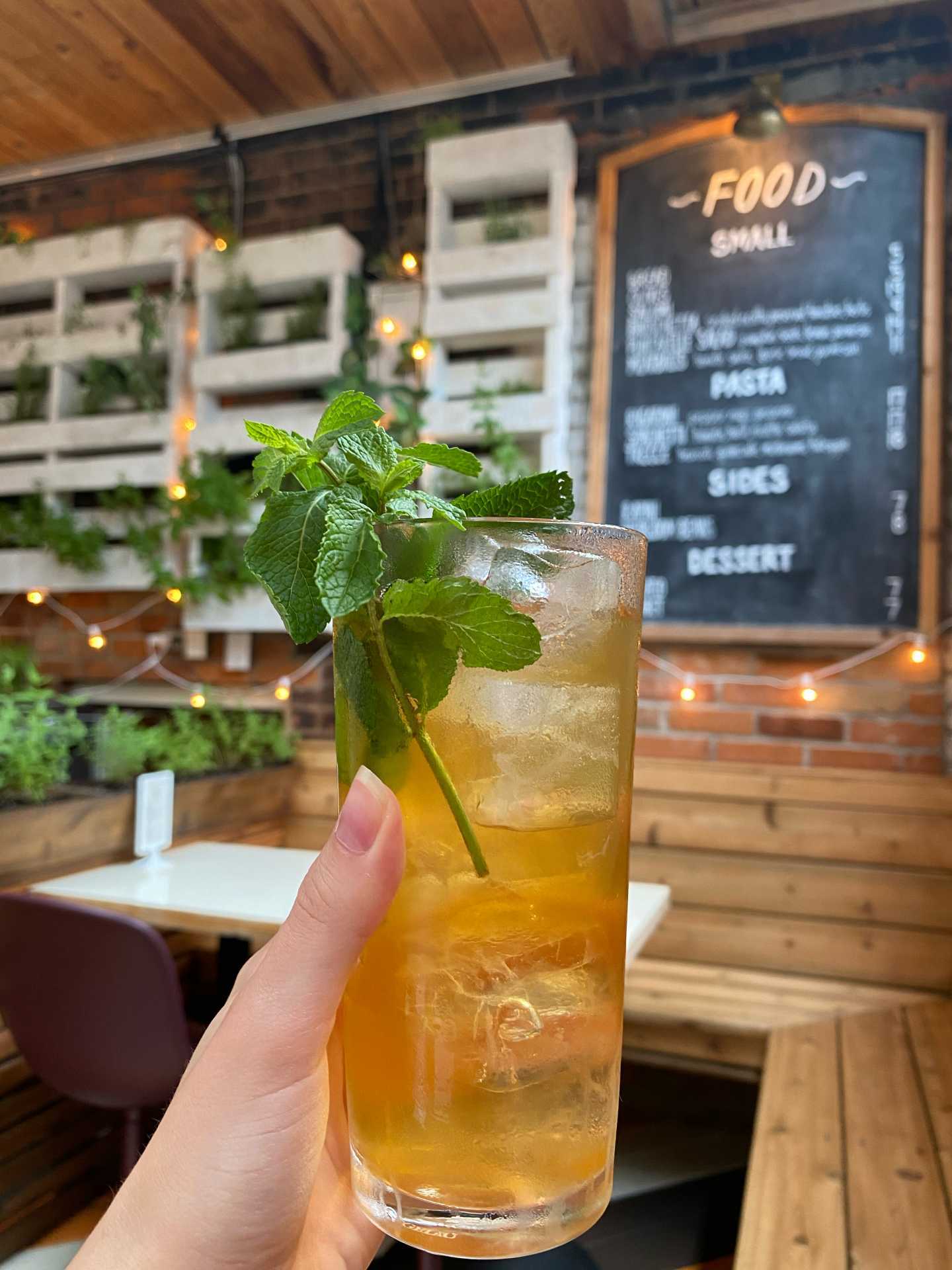 Best patios in Toronto | A cocktail on the back patio at Bar Vendetta on Dundas West