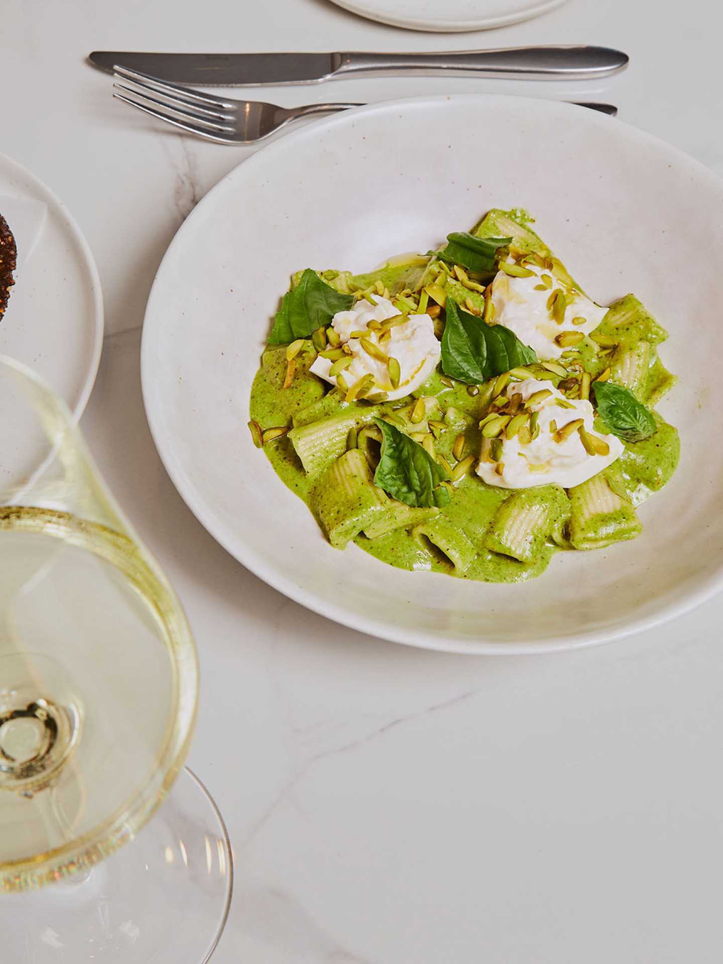 Rigatoni and wine at Henry's restaurant Toronto