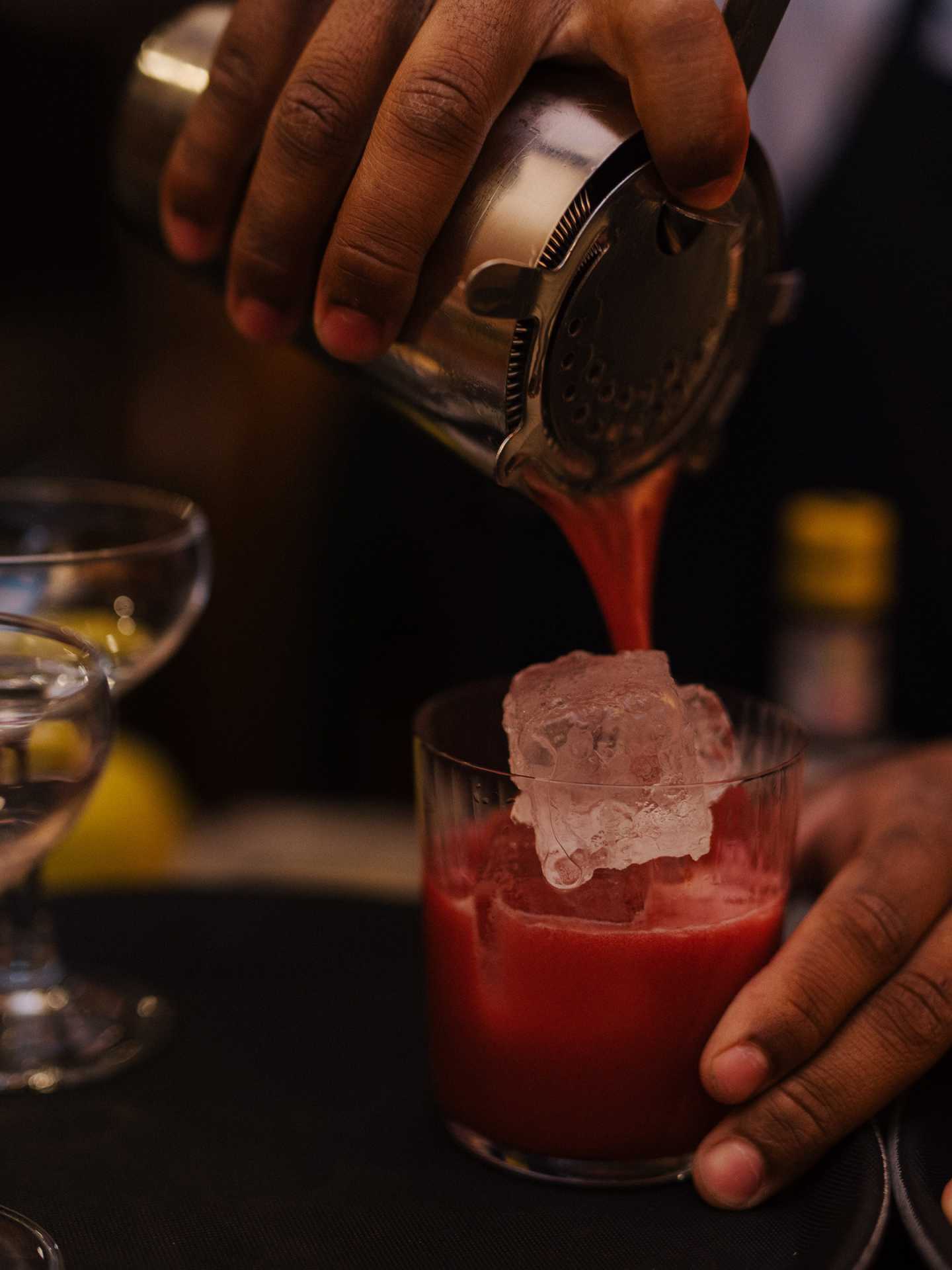 Best new Toronto restaurants | Pouring a cocktail at Takja BBQ House