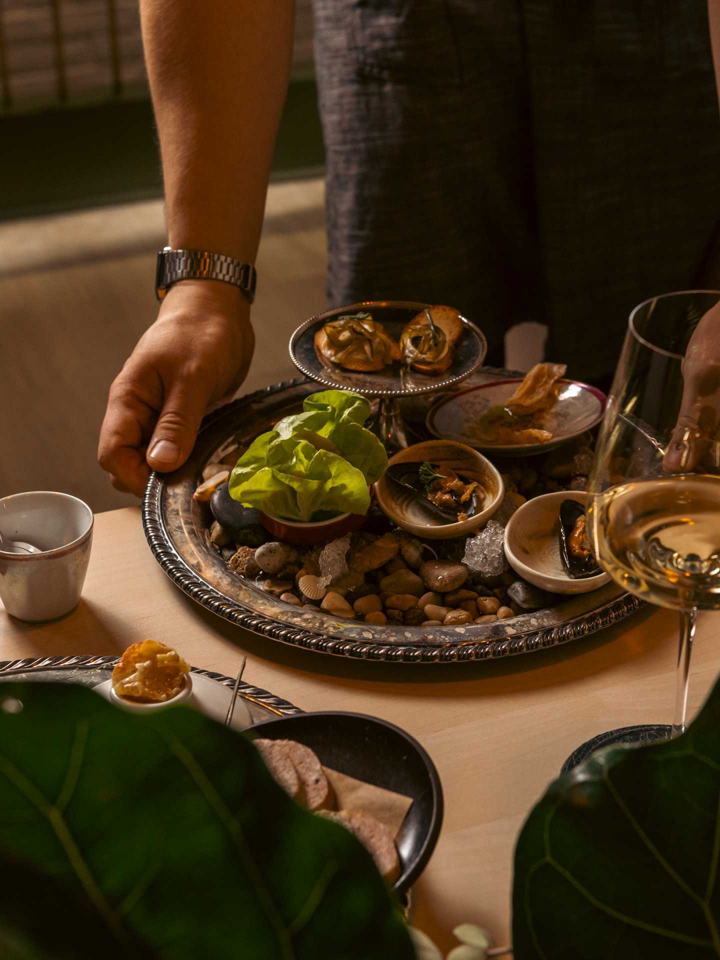 Best new restaurants in Toronto | Chef Gerry Quintero hand delivers a course at his Little Italy tasting menu spot, Ficoa