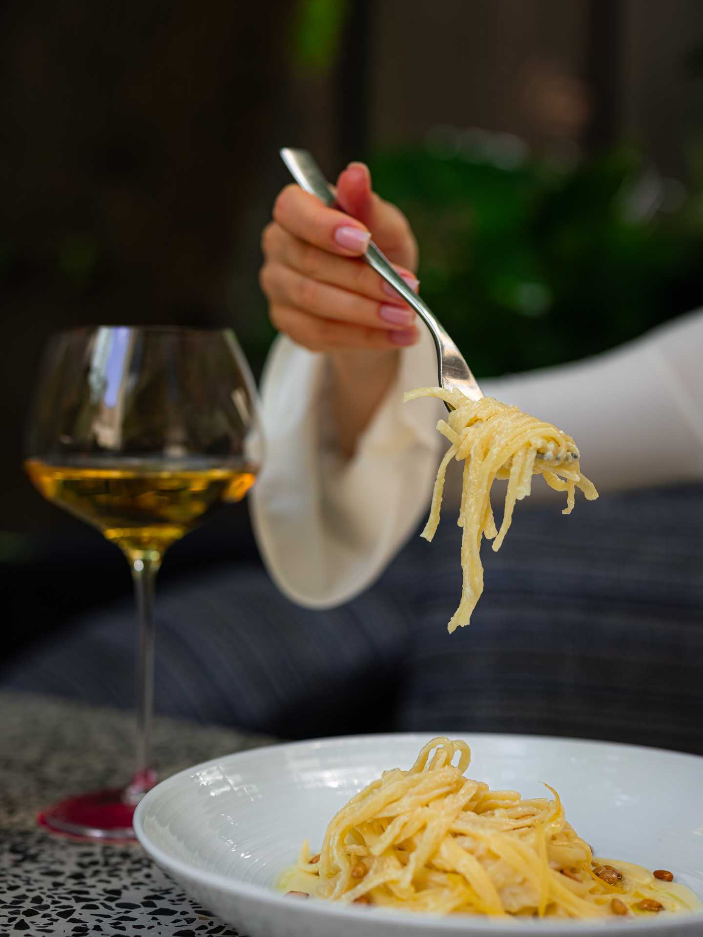 Italian restaurants Toronto | Someone scoops up a forkful of noodles at Sofia Italian Restaurant Toronto