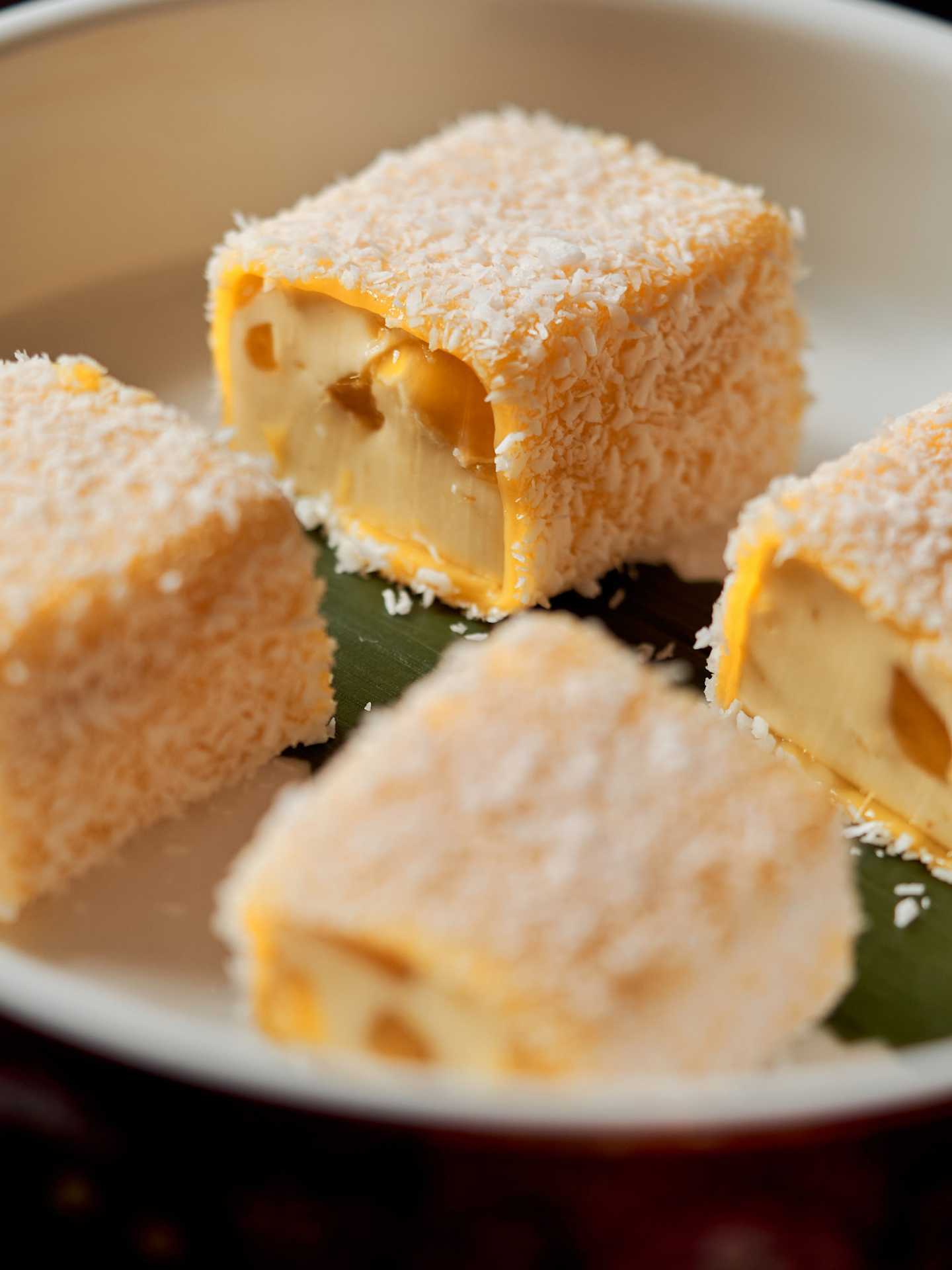 Mott 32 Toronto | Fresh mango glutinous rice roll with coconut Mott 32 Toronto | Fresh mango glutinous rice roll with coconut