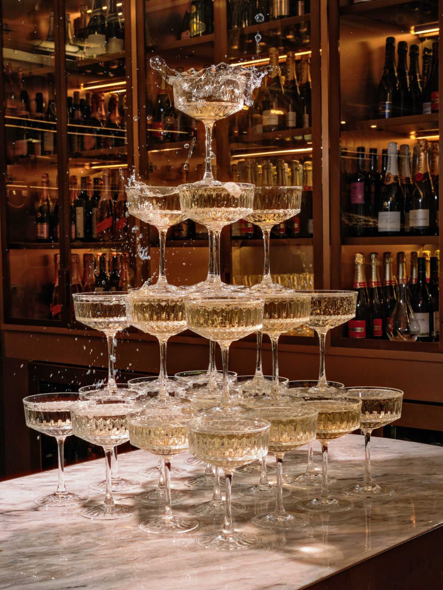 The best bars in Toronto | A tower of champagne coupes at Coffee Oysters Champagne